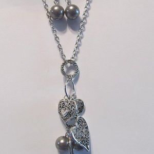 5 older Paparazzi pieces of silver and mixed metal necklace and earring sets